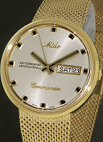 Pre-Owned MIDO COMMANDER AUTO DATODAY YELLOW